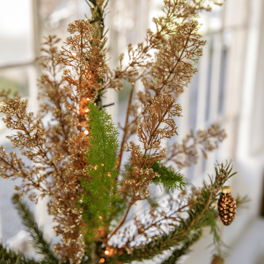 Branches et feuillages artificiels pour décorer le sapin de Noël