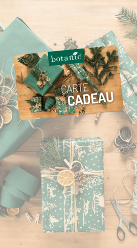 Carte cadeau botanic sur un fond emballages cadeaux
