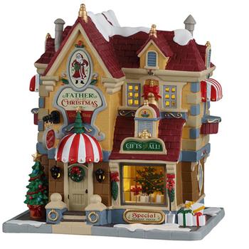 Visuel 1 du produit Village de Noël boutique de cadeau du Père Noël lumineux en porcelaine coloris multicolore adaptateur inclus Lemax Caddington Village - 19,7 x 17,8 x 13,5 cm
