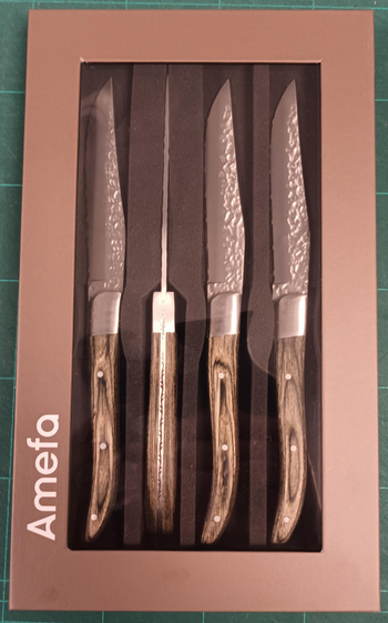 Visuel 1 du produit Coffret 4 couteaux steak inox et noyer pakka Laguiole Amefa collection Volcano - 22,5 cm