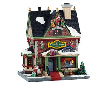 Visuel 1 du produit Village de Noël boutique de cadeaux lumineuse en porcelaine coloris multicolore avec adaptateur Lemax Caddington Village