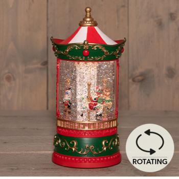 Visuel 1 du produit Décoration de Noël lumineuse lanterne boule à eau manège en PVC coloris rouge LED blanc chaud à piles - H 20,5 x Ø 9 cm