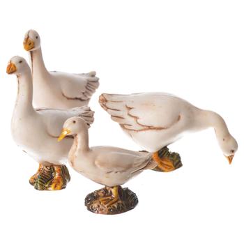 Visuel 1 du produit Set de 4 oies pour crèche ou village de Noël coloris blanc en PVC - 10 cm