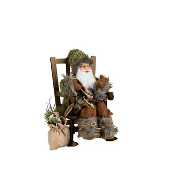 Visuel 1 du produit Père Noël décoratif Alpin sur une chaise à bascule en polyester coloris vert et marron - H 30 cm