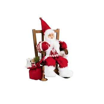 Visuel 1 du produit Père Noël décoratif Rubineige sur une chaise à bascule en polyester coloris rouge et blanc - H 30 cm