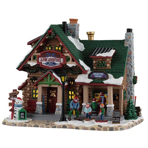 Visuel 1 du produit Village de Noël école de ski alpine adventures lumineux en porcelaine coloris multicolore adaptateur inclus Lemax Vail Village - 17 x 20 x 14,3 cm
