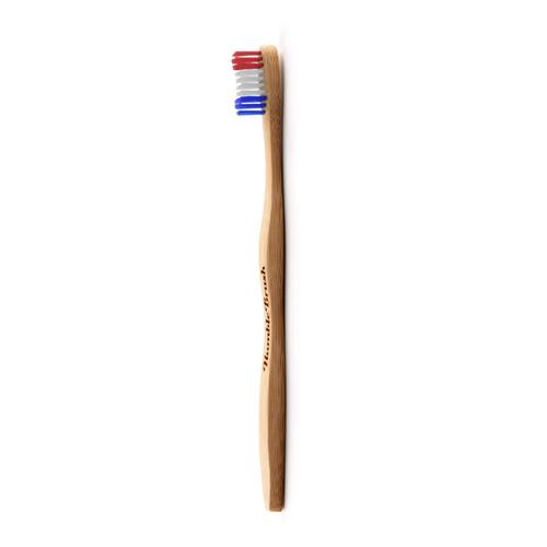 Visuel 1 du produit Brosse à dents pour adulte en bambou souple coloris bleu blanc rouge